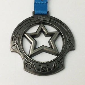 Silver star shape metal medal