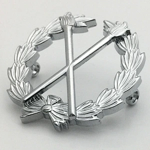 Silver torch pin badge