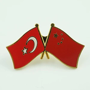 Cross flag lapel pin