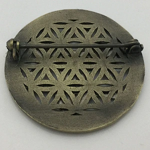 Antique hollow out pin badge