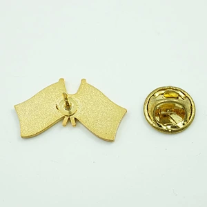 Cross flag lapel pin