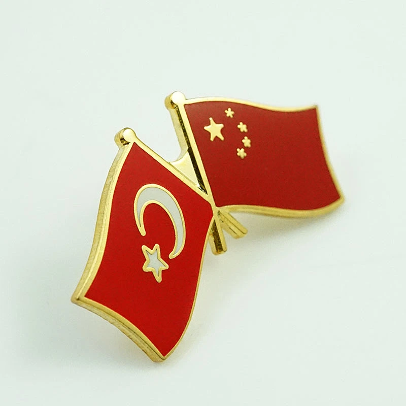 Cross flag lapel pin