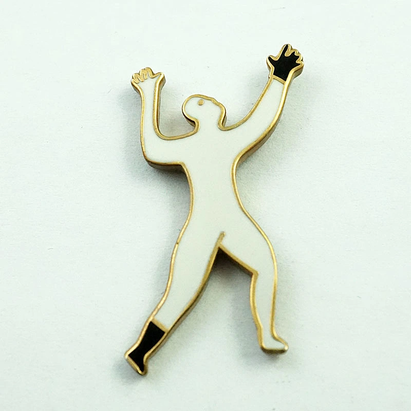 Metal man shaped pin badge