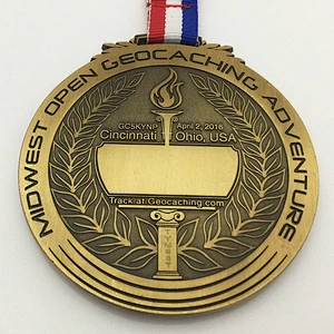 Geocaching  adventure antique gold medal