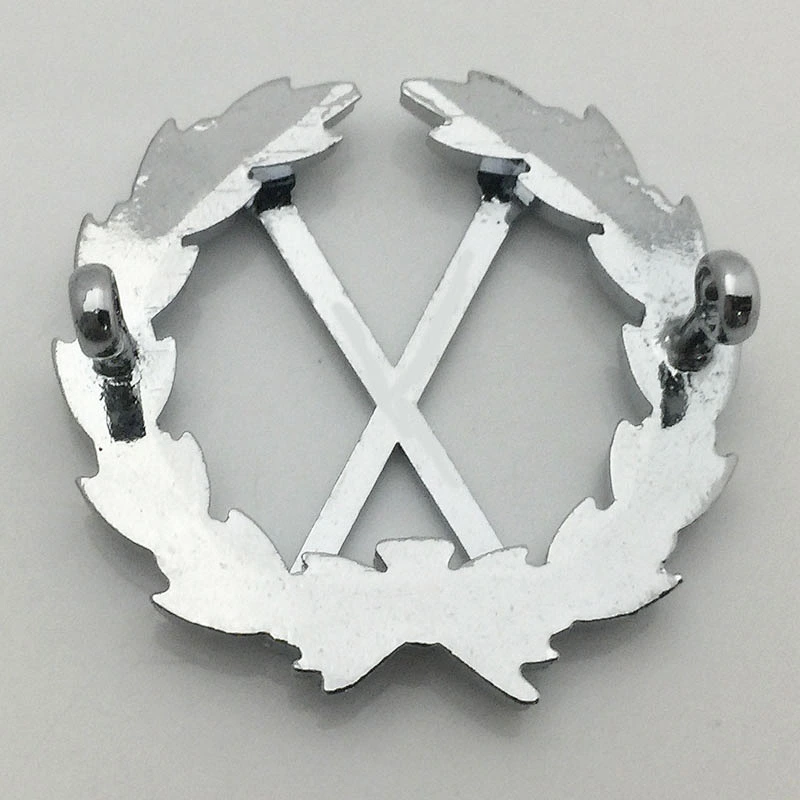 Silver torch pin badge