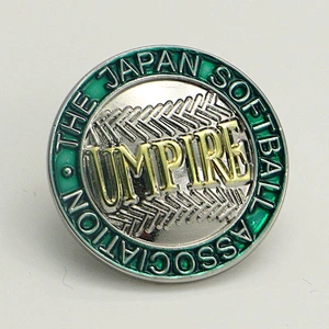 Stoving varnish badge