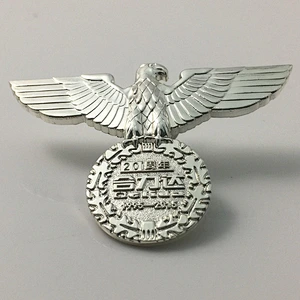 Silver German eagle pin