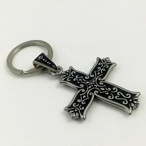 Cross shaped metal keychain