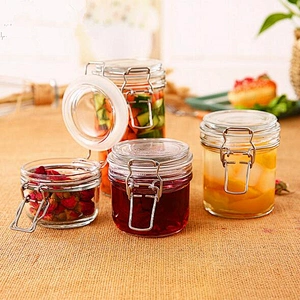round clear glass food jar with metal clip