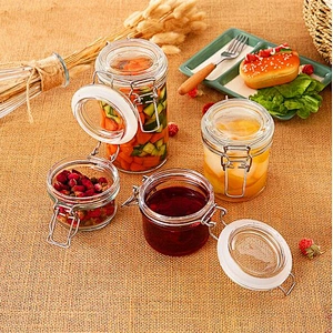 round clear glass food jar with metal clip