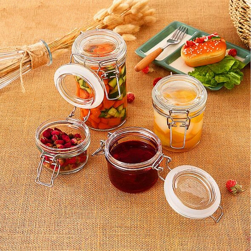 round clear glass food jar with metal clip
