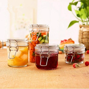 round clear glass food jar with metal clip