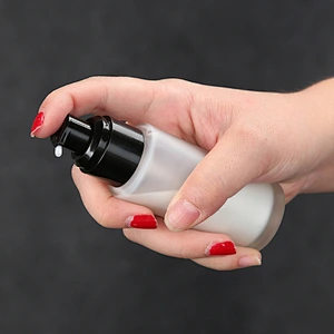 Cosmetics frosted glass bottle with spray pump