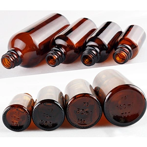 amber brown boston round glass bottle with fine mist sprayer