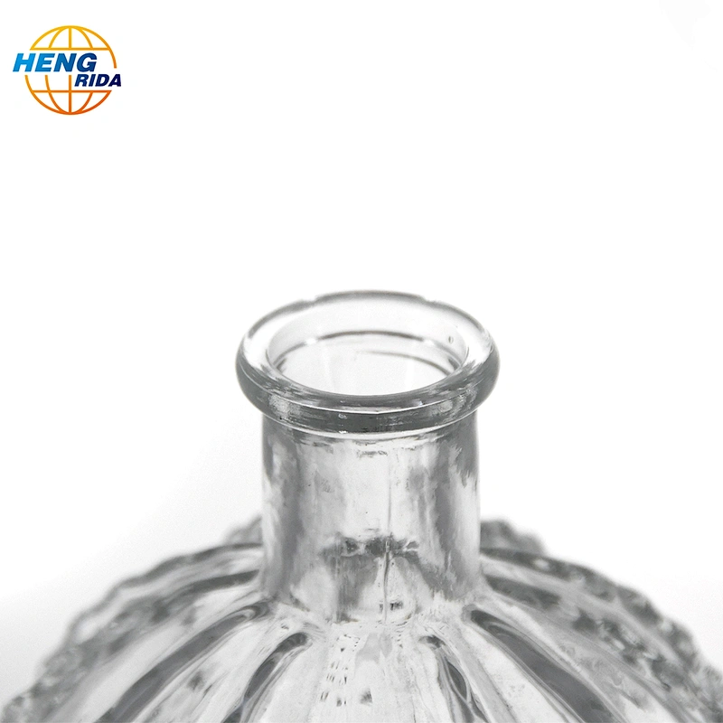 A clear glass cactus ball vase