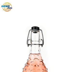 1000ml glass bottle of fruit juice with The rain patterns