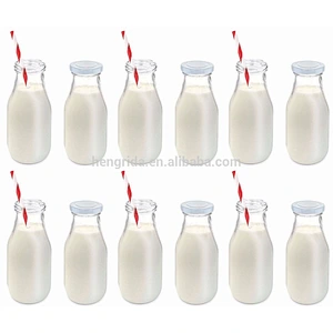11Oz Glass Milk Bottle Including Reusable Lids and Straws