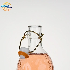 1000ml glass bottle of fruit juice with hammer pattern