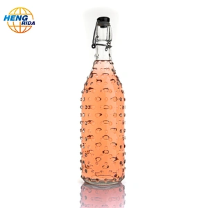 1000ml glass bottle of fruit juice with The rain patterns