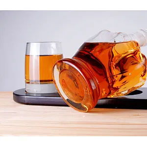 Thumb shaped whiskey bottle with high borosilicate material