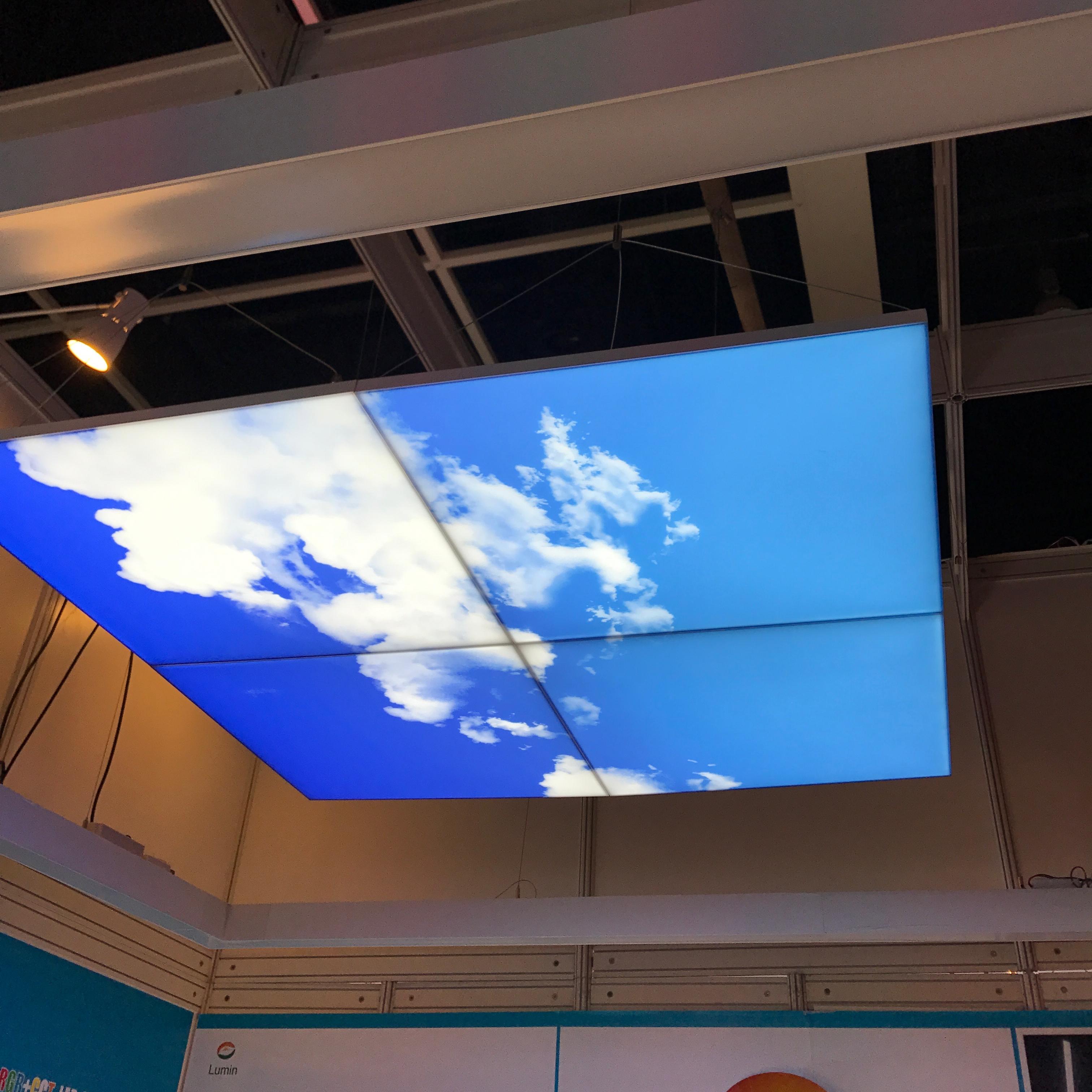 lumin suspend installation frameless sky panel in the booth showcase