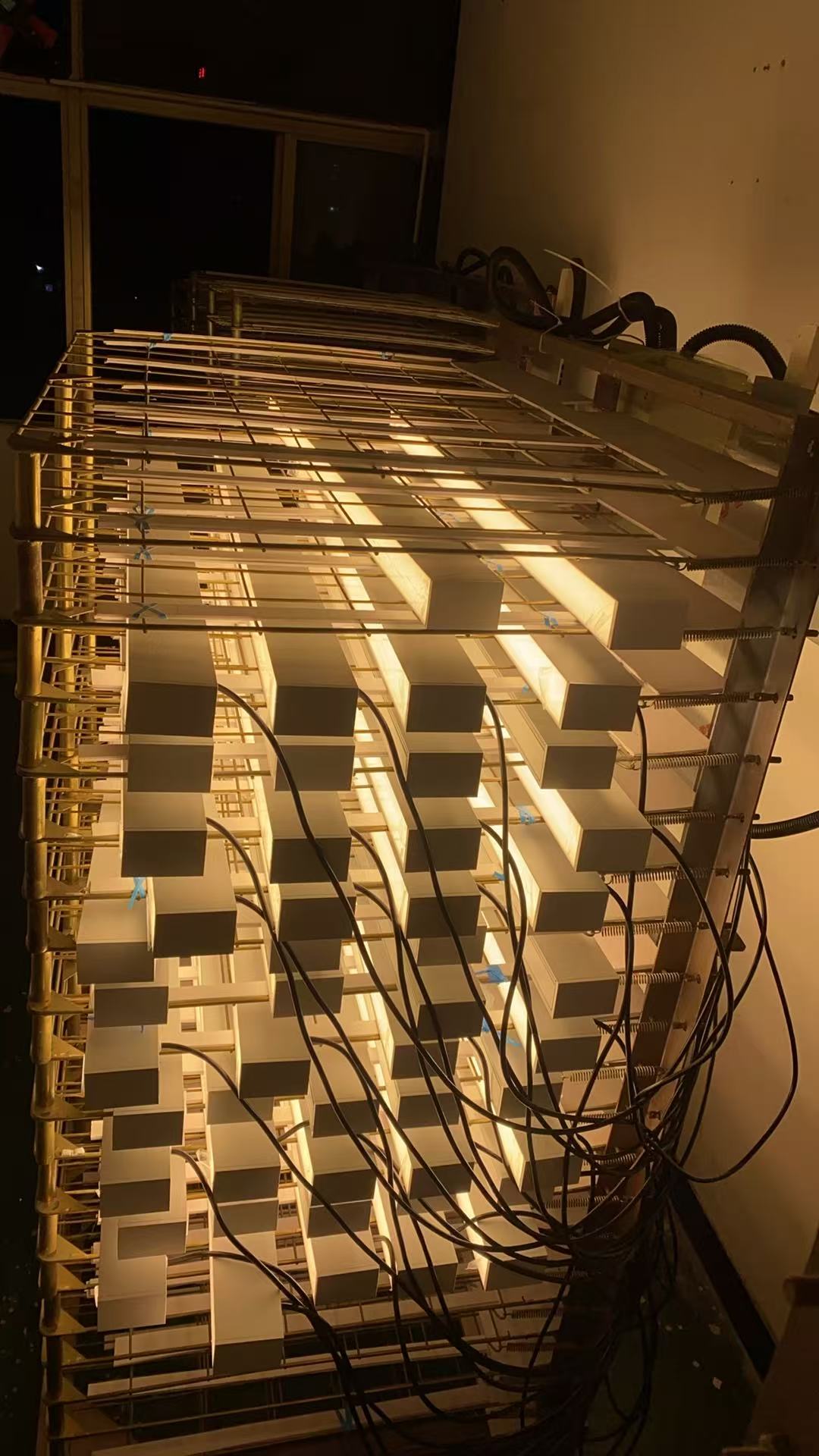 Lumin UltLine X2 linear lights in factory aging test room ensuring 50000 hours lifespan quality
