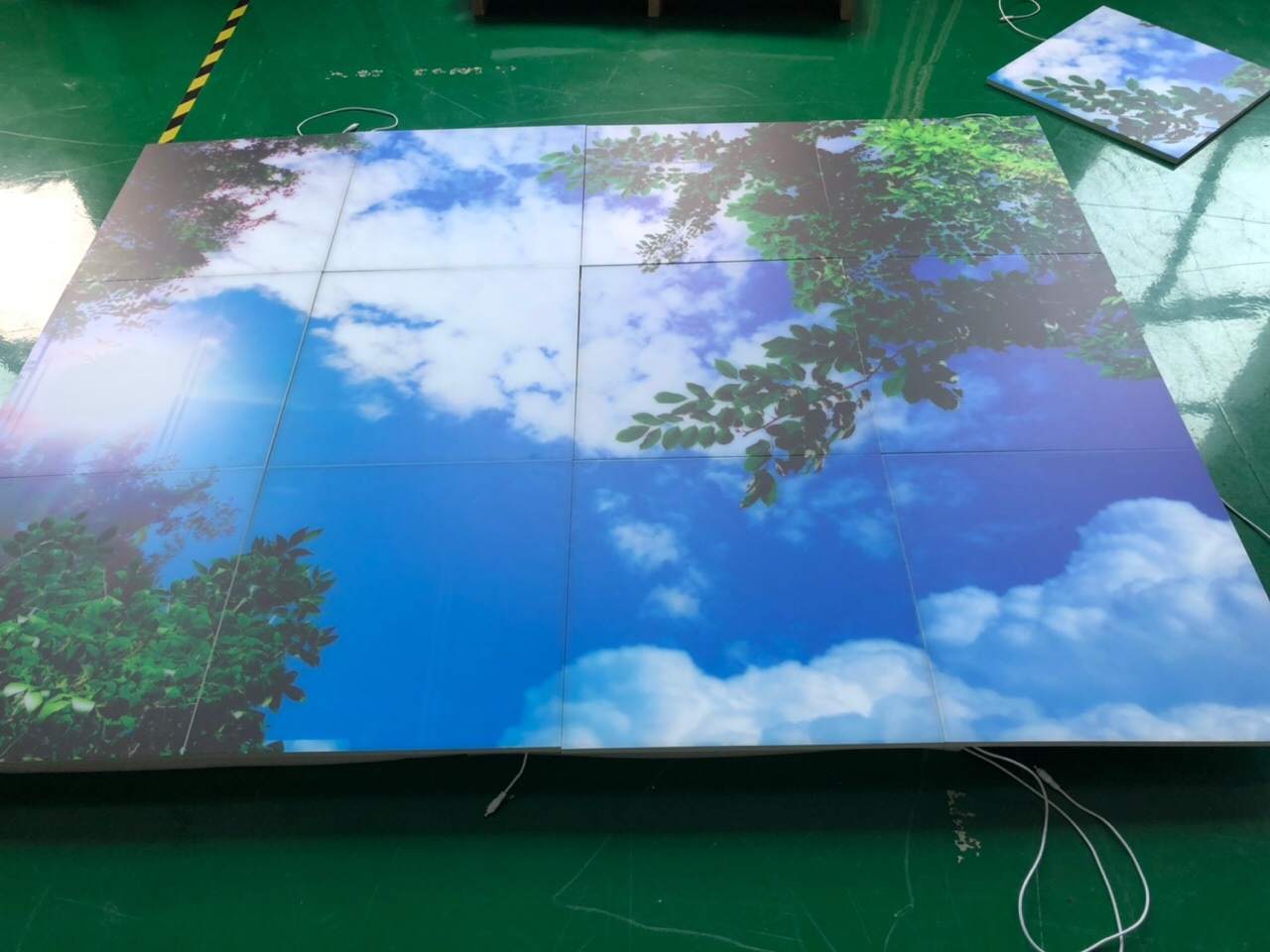 Frameless LED panel featuring forest and sunlight design – tunable white or blue sky effect for relaxing environment