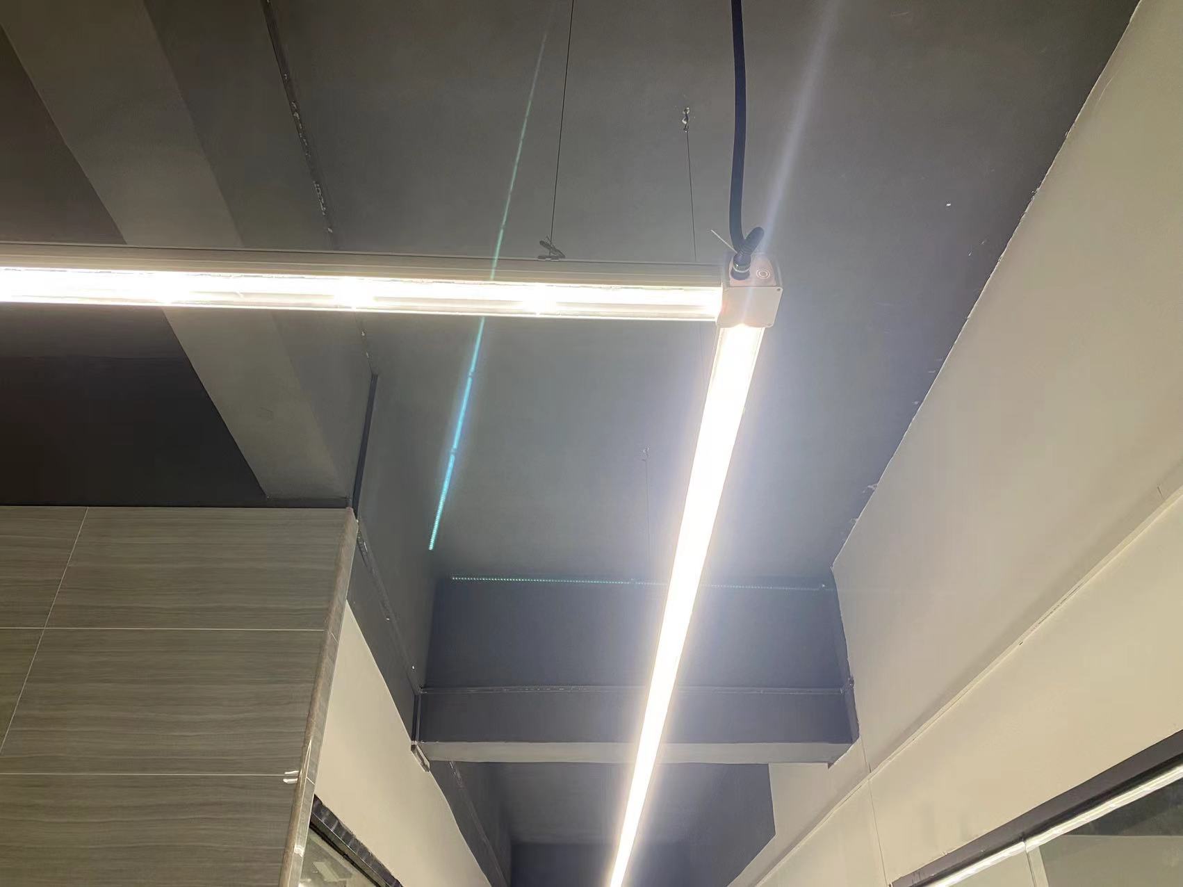 Lumin X1 linear trunking system in a modern  corridor, delivering seamless and glare-free ambient lighting with sleek minimalist design.