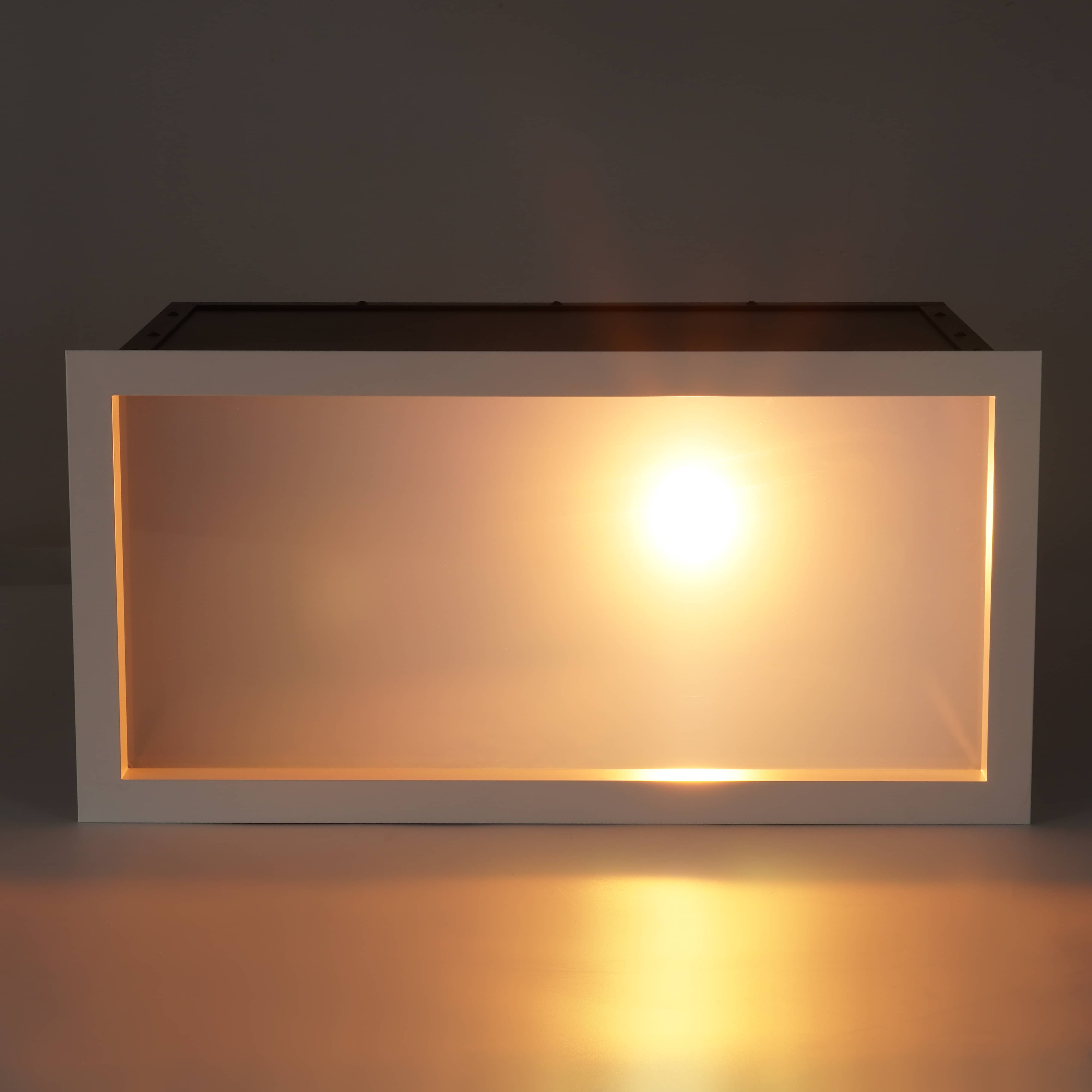Lumin Sun-in-sky artificial skylight featuring built-in COB artificial sun module, emitting warm directional light beam against a soft blue sky background, designed for lobbies and retail spaces