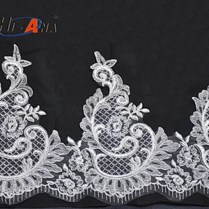 Over 95% accessories exported Fancy african lace embroidery fabric for wedding dress