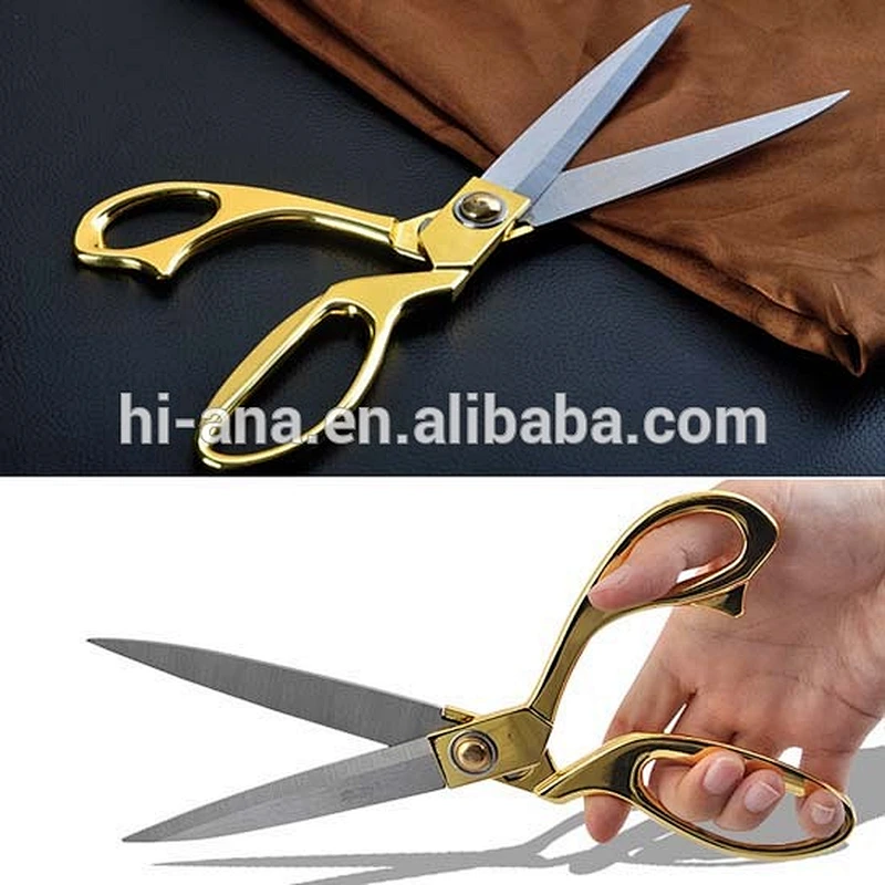 Golden scissors for cutting fabric