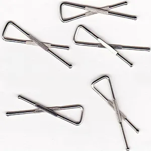 Metal clip for shirt packing
