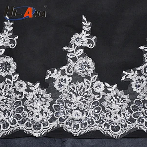 Familiar in OEM and ODM customised LOGO printed wedding lace fabric