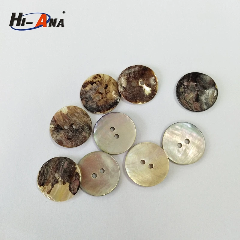 size 22L.black butterfly shell button China supplier