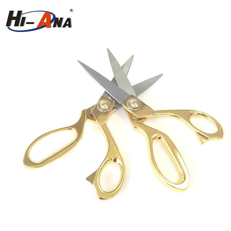 Golden scissors for cutting fabric