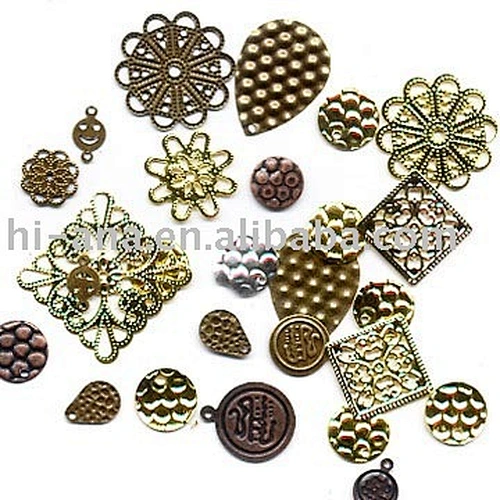Decorative metal flake for garment decoration