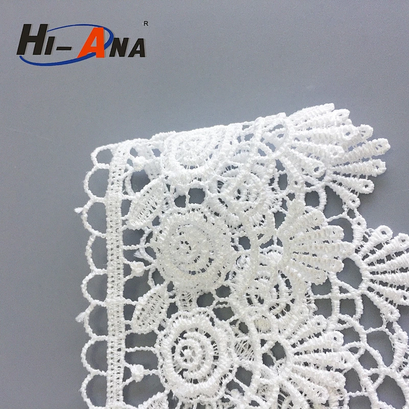 Stict QC 100% Yiwu chemical lace embroidery fabric