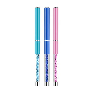 A makeup brush with a diamond handle and cap for brushing eyelashes