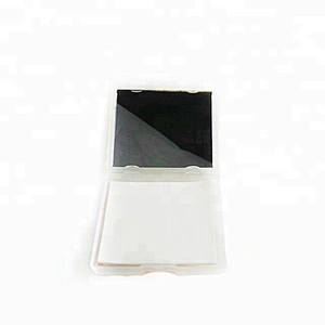 Facial oil blotting paper with mirror and puff