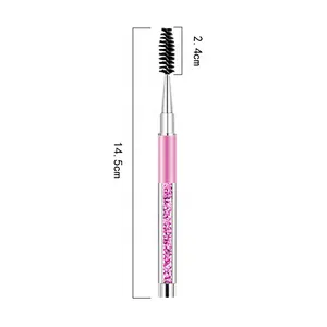 A makeup brush with a diamond handle and cap for brushing eyelashes
