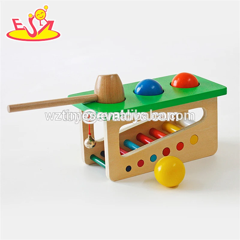 Hölzernes klopfendes Spiel des bunten Uhrformbabyhammer-Spielzeugs für Kindmuskelübung W11G015