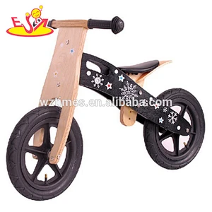 Wholesale wonderful wooden kids black balance bike to help baby quickly learn to ride W16C017