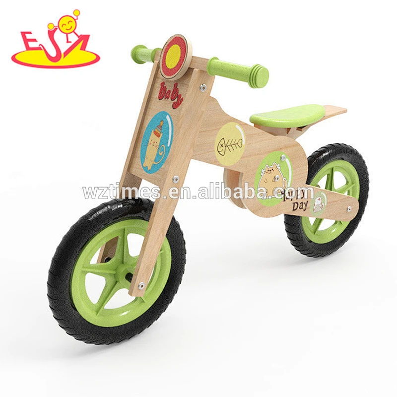 Wholesale brand new wooden cartoon balance bike hot sale baby wooden cartoon balance bike W16C183