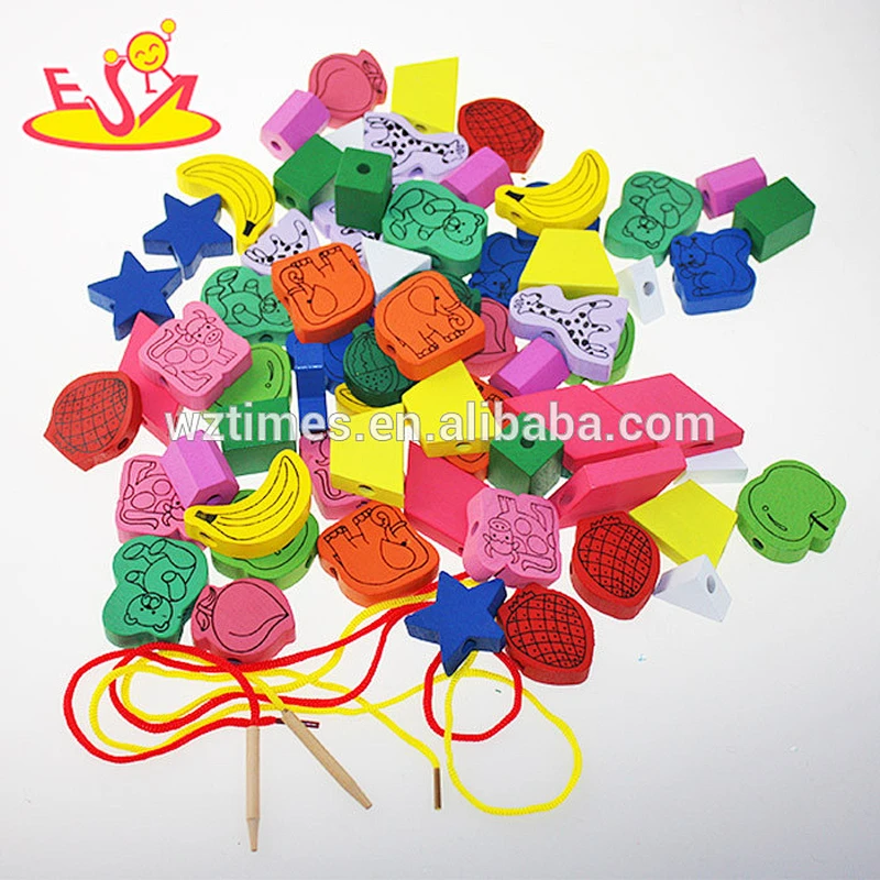 Hölzerner fädelnder großer Schmuck des Großhandelsverkaufs Spielzeug lustiges Einfädeln multi Formkornspielzeug W11E040