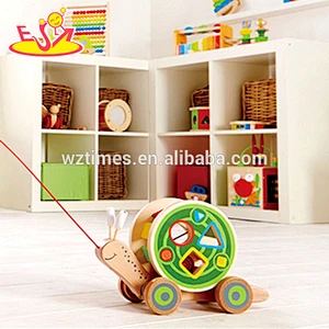 Schnecken-Spielzeugauto W05B155 des Großhandelsqualitätskostens billig hölzerne hölzerne