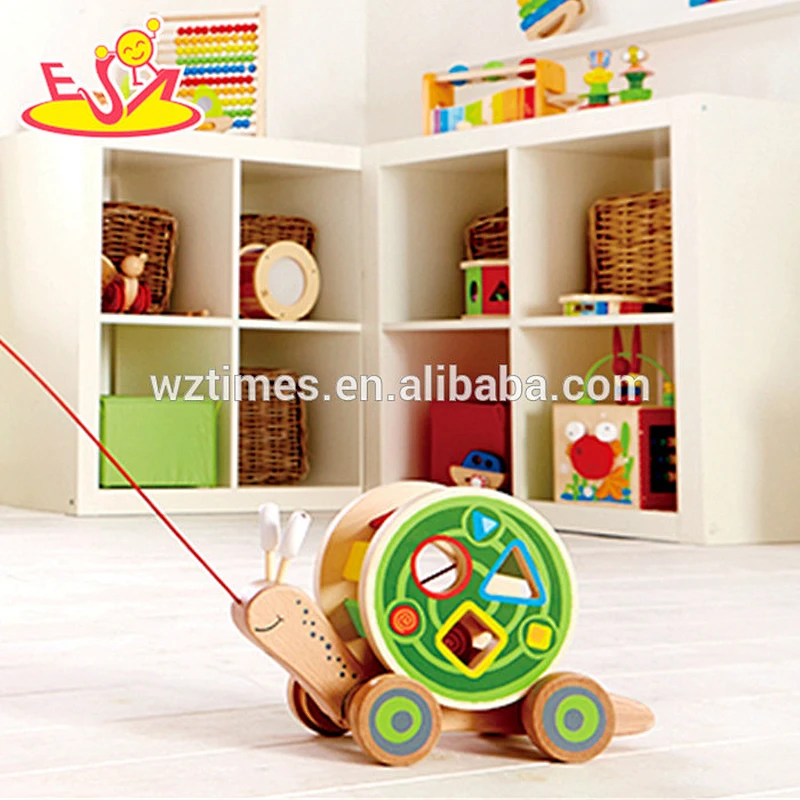 Schnecken-Spielzeugauto W05B155 des Großhandelsqualitätskostens billig hölzerne hölzerne
