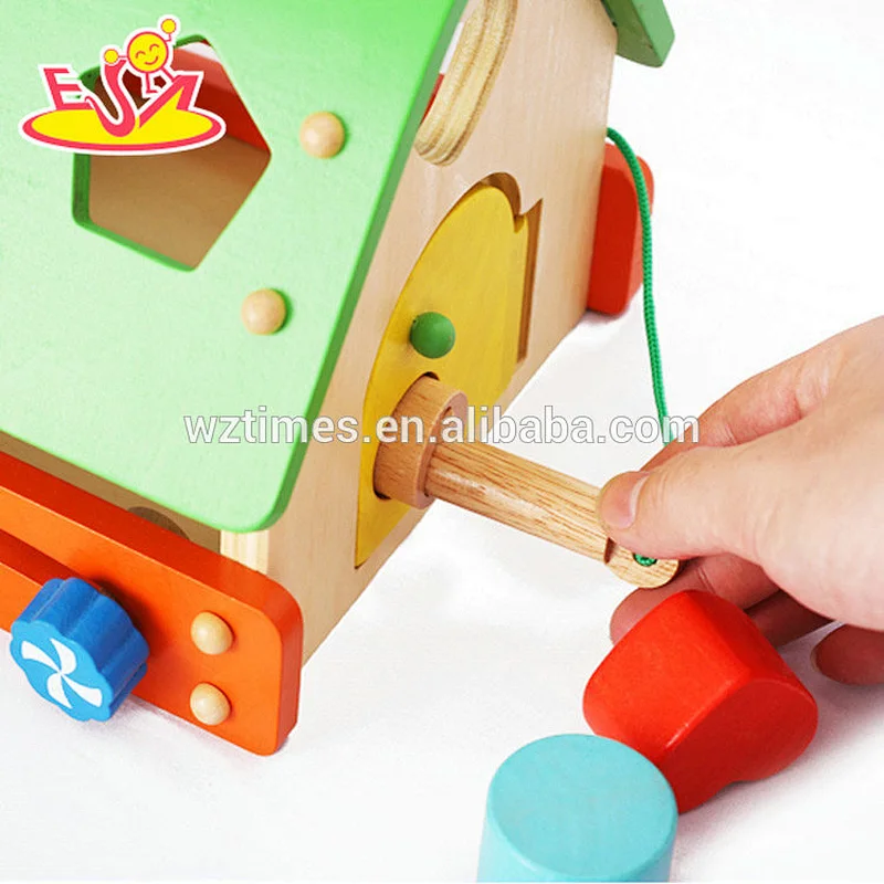 Hölzerne geometrische Blöcke der Großhandelskinder formen Spielzeug mit Haus W12D079