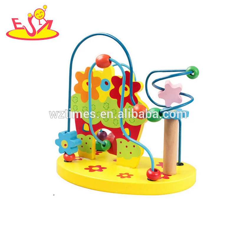 Reizendes einzigartiges hölzerner Korne schnüren Spielspielzeug für Baby W11B166