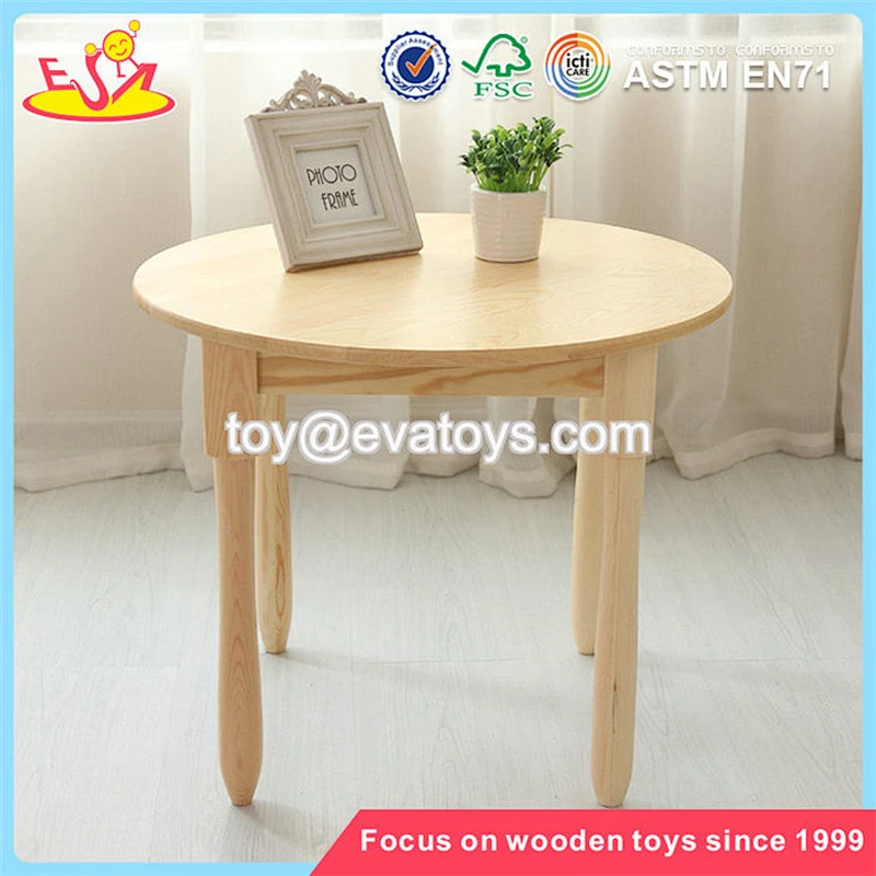Wholesale simple style kids wooden round table and 4 chairs used in home and school W08G232