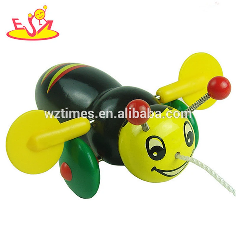 wholesale hot promotional mini wooden bee drag toy unique wooden bee drag toy W05B111
